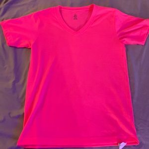 Plain hot pink V-neck T-shirt. In good condition. Fits a bit loose.